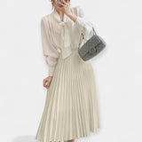 Noémi | Magas derekú pliszírozott szoknya